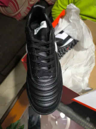 Zapatillas multitacos negras y blancas