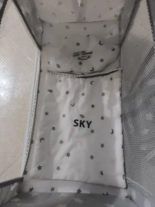 Cuna de juguete para muñeca