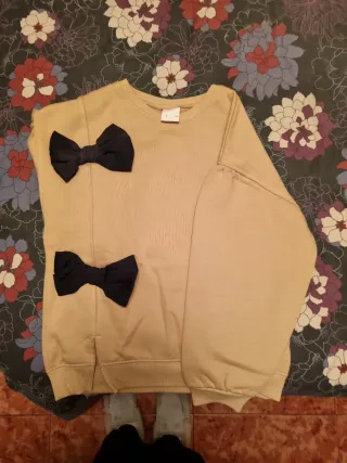 Jersey niña Zara beige con lazos negros