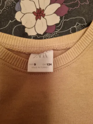 Jersey niña Zara beige con lazos negros