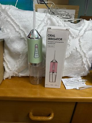 Irrigador bucal portátil recargable