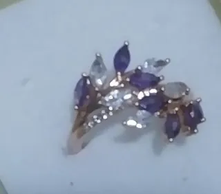 Anillo Oro rosa 585 con Circonitas Moradas blancas