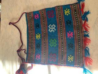 Borsa a tracolla tessuta a mano con motivi decori