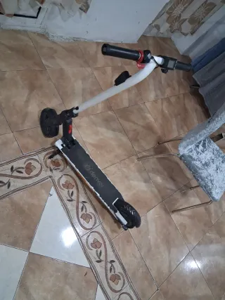 Patinete Eléctrico Denver con su cargador