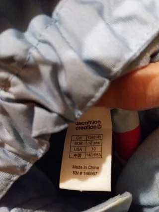 Mono de nieve infantil azul y blanco