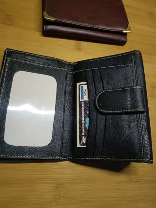 2 Carteras de piel a precio de coste.Precio de 2.