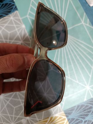 Gafas de sol Polaroid mujer negras y marrones