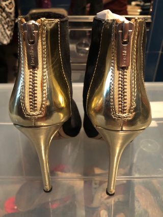 Botines Bershka fiesta negro y dorado