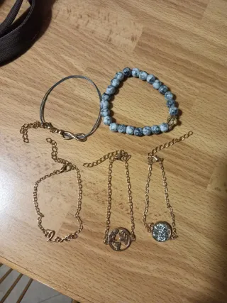 5 bracciali donna oro e grigio