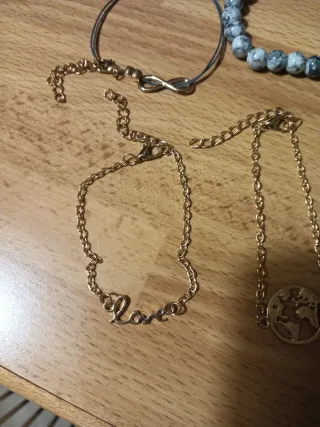 5 bracciali donna oro e grigio