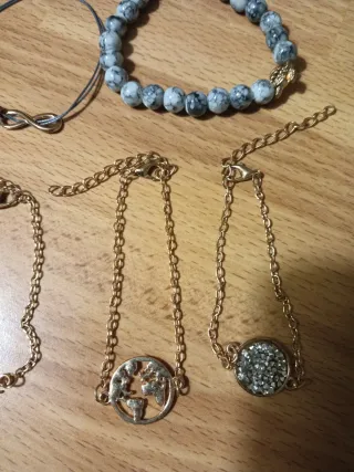5 bracciali donna oro e grigio