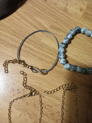 5 bracciali donna oro e grigio
