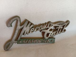 Anagrama Mecany Textil Manresa Aluminio