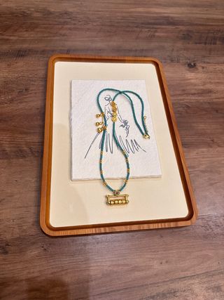 Collar largo oriental piedra azul y oro