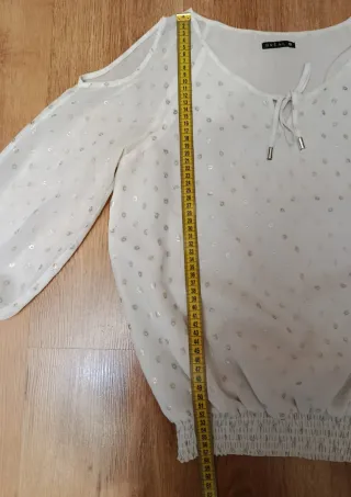 Blusa blanca con estampado plateado talla 38