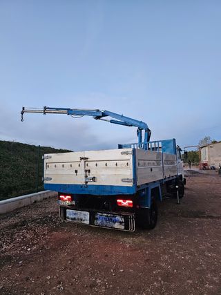 Camión grúa con caja basculante Man