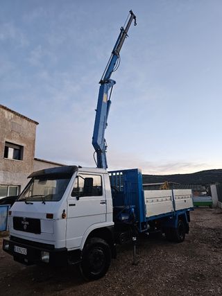 Camión grúa con caja basculante Man
