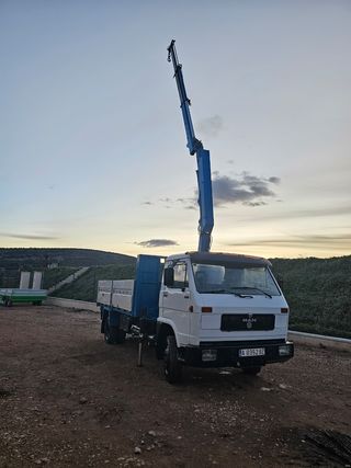 Camión grúa con caja basculante Man