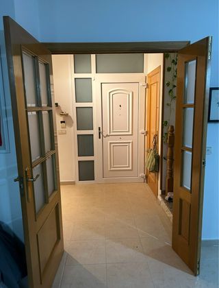 Puerta doble madera con cristal