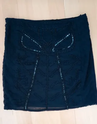 Falda mini Lefties lentejuelas negra