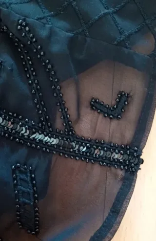 Falda mini Lefties lentejuelas negra