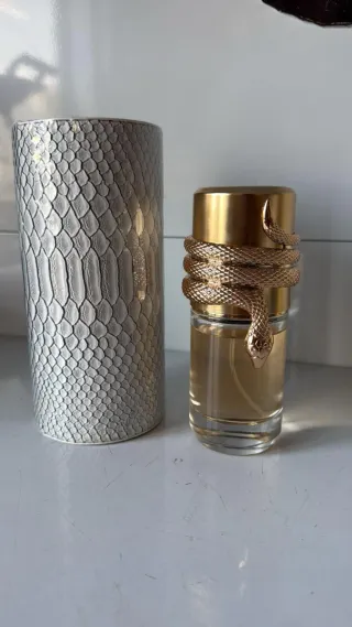 Profumo donna serpente dorato