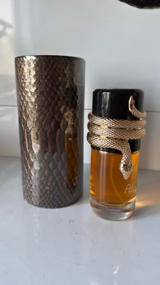 Profumo donna serpente dorato