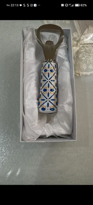 Apribottiglie design ceramica e metallo