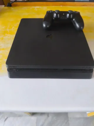 PS4 (PlayStation 4) Negra + Mando + 2 Juegos