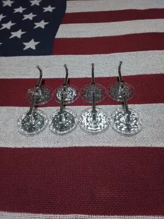 8 Ganchos Transparentes.