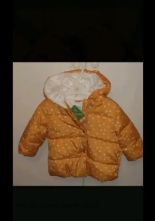 Cappotto giallo con stampa floreale