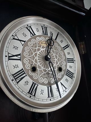 Reloj de péndulo antiguo