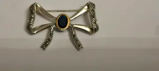 Alfinete de peito antigo com pedra azul