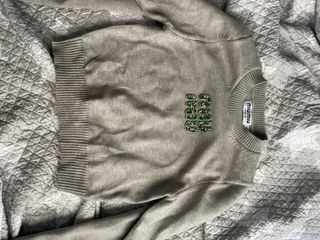 Maglia Miu Miu grigia con logo brillante