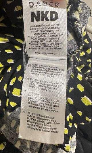 Blusa negra con estampado amarillo