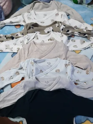 8 Bodys Manga Larga C&A 6-9 Meses