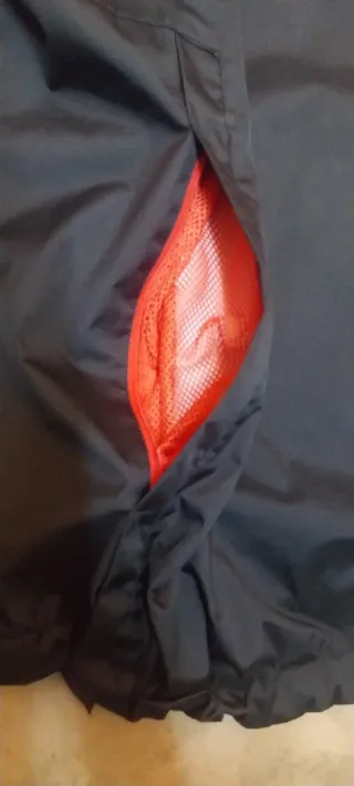 Chubasquero ciclismo Rockrider Negra/Roja