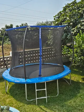 Cama elástica con red de seguridad