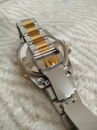 Orologio Uomo(Nuovo) oro/acciaio inox.Confezione.