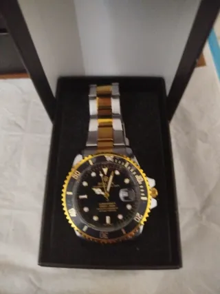 Orologio Uomo(Nuovo) oro/acciaio inox.Confezione.