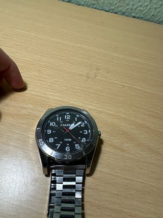 Reloj Calypso Plateado con Pequeño Daño