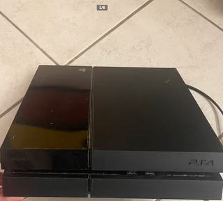 Playstation 4 con 2 Joypad e 16 giochi