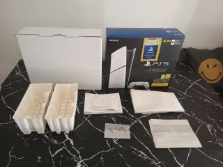 Caja PS5 Digital Edition con manuales