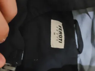 Giacca antivento blu e grigia