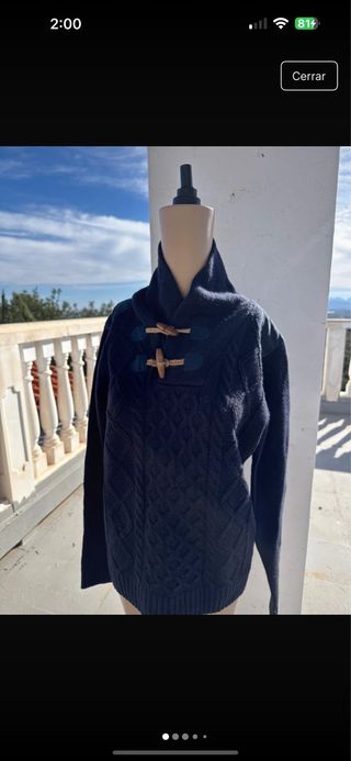 Jersey de lana azul con trenzas