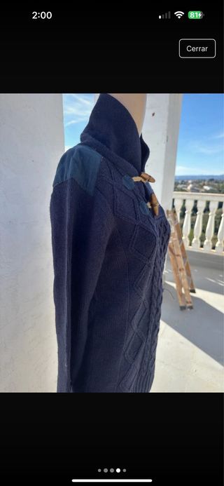 Jersey de lana azul con trenzas