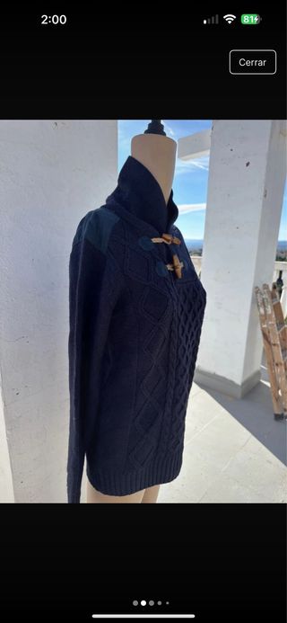 Jersey de lana azul con trenzas