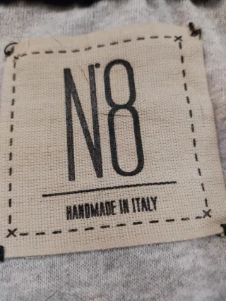 Giacca nera pelliccia di lapin zip asimmetrica