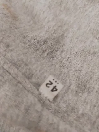 Giacca nera pelliccia di lapin zip asimmetrica