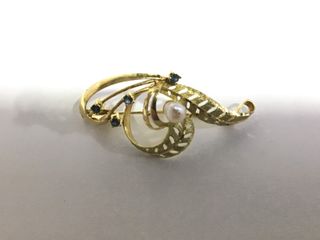 broche oro 18k con piedra